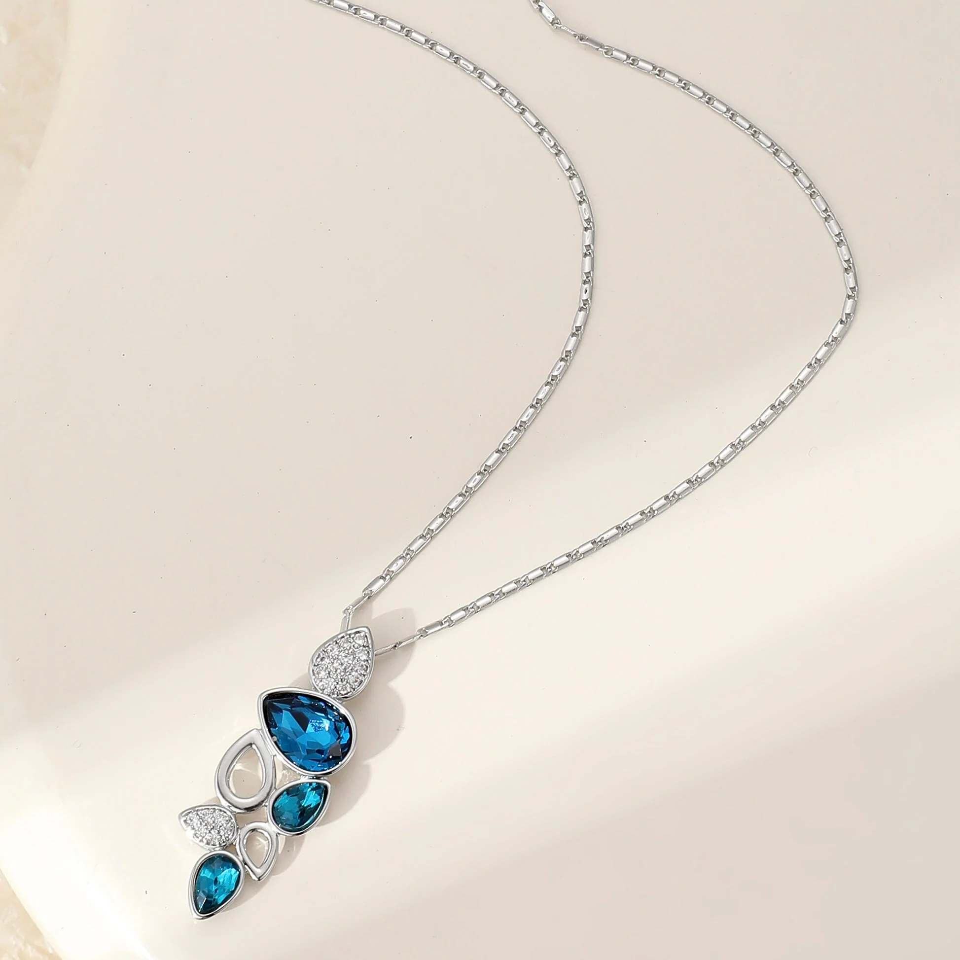 Blue Crystal Leaf Stud Earrings - Image 3